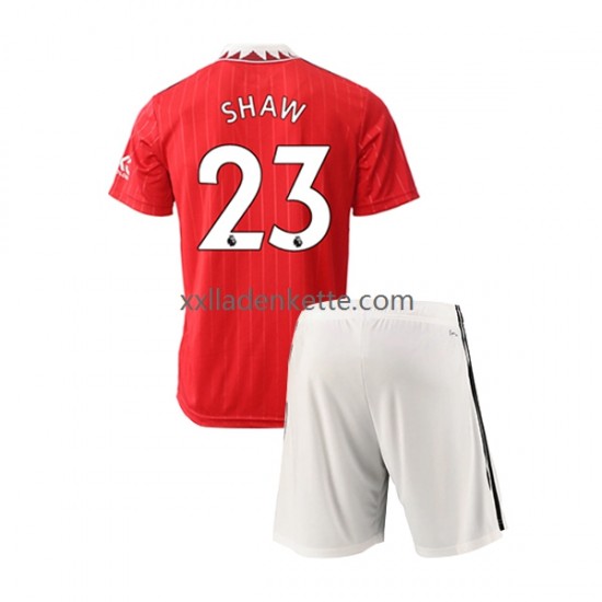 Fußballtrikot Manchester United Luke Shaw 23 Kinder Heim 2022-2023 Kurzarm